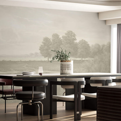 Maßangefertigte Vliestapete mit pastellfarbener Landschaft und Bäumen im dezenten Vintage-Stil im Wohnzimmer.