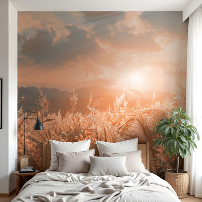 Maßangefertigte Vliestapete mit Sonnenuntergang über Getreidefeld in warmen Orange- und Rosatönen.