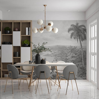 Mordernes Esszimmer mit hellem Interior mit grauer Fototapete mit Dschungel Landschaft und Palmen.